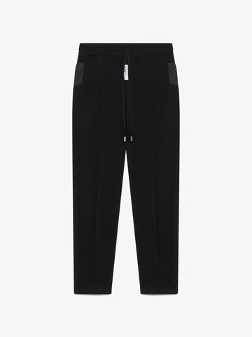 PANTALONI ACTIVE IN NYLON MISTO PIQUET CON COULISSE GCDS